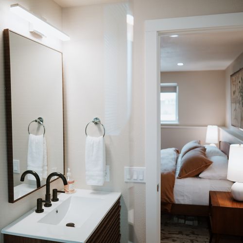 Our ensuite mezzanine king bathroom and bedroom combo is your private oasis (with it's own out-door access! ).