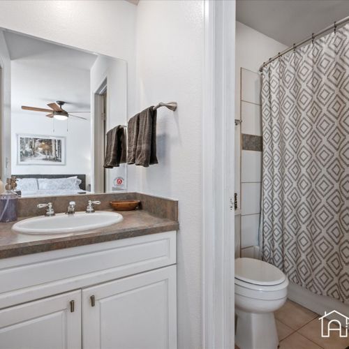 Freshen up in the clean and modern bathrooms, each equipped with a shower/tub combo and ample toiletries for your comfort.