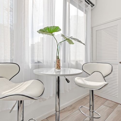 Elevating the art of dining with the gentle touch of natural sunlight.