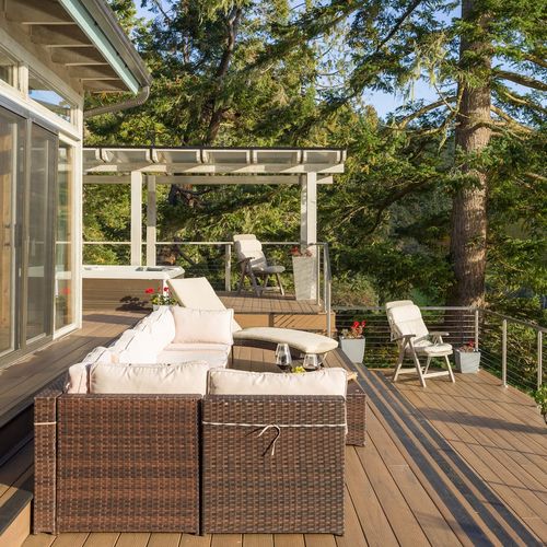 Outdoor patio with seating is perfect space for  family and friends