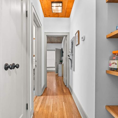 Hall to Main Bath & Downstairs BR's