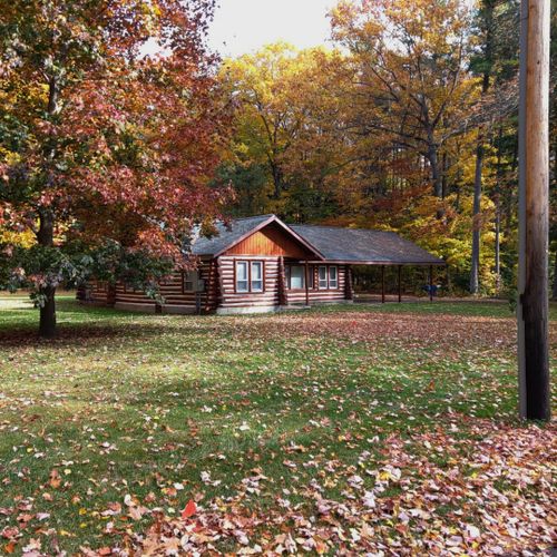 Exterior:  another view of the front of the cabin in fall.