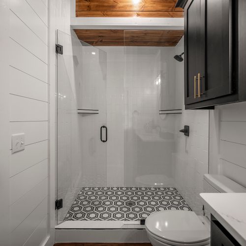 The private attached bathroom with a walk-in shower.