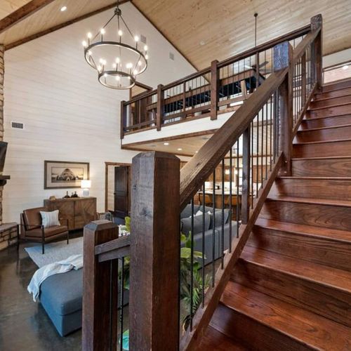 Upstairs leads to the loft and additional bedrooms.