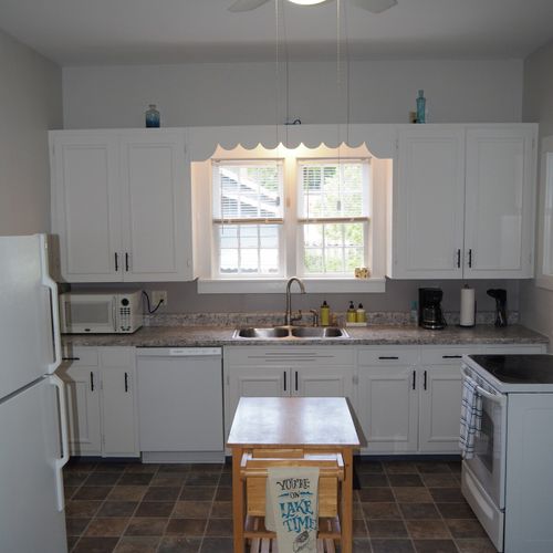 Kitchen:  the home has a huge kitchen that is complete with all modern appliances, including a dishwasher. A good supply of cooking and dining utensils are included as well.