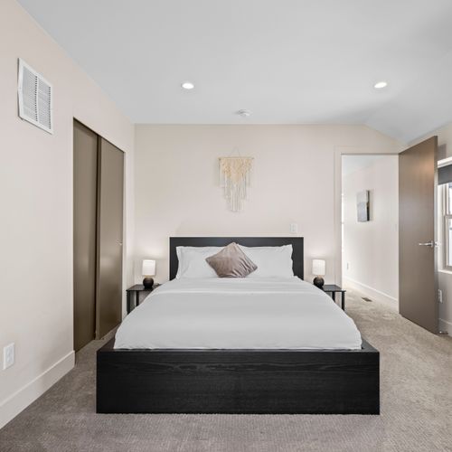 Unwind in a tranquil space with a queen-size bed.