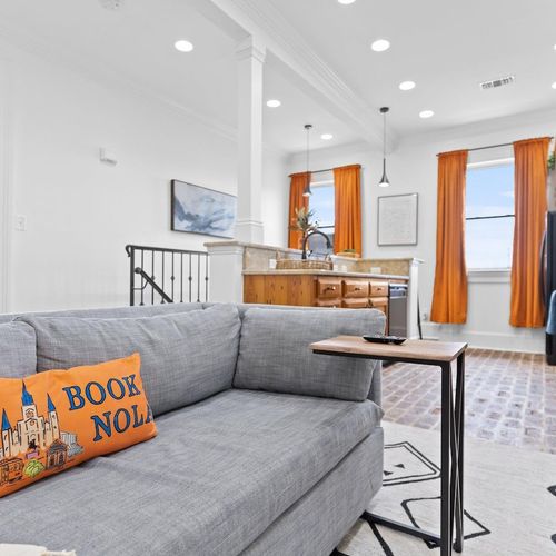 Living room flows into the kitchen — perfect layout for gathering & entertaining.