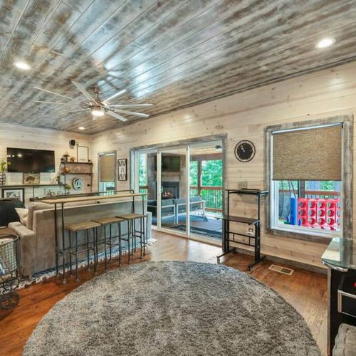 Upstairs is the loft/game room with a private balcony.