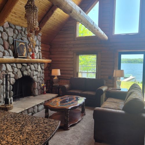 Living room:  the cute and cozy living room with an extravagant fireplace
