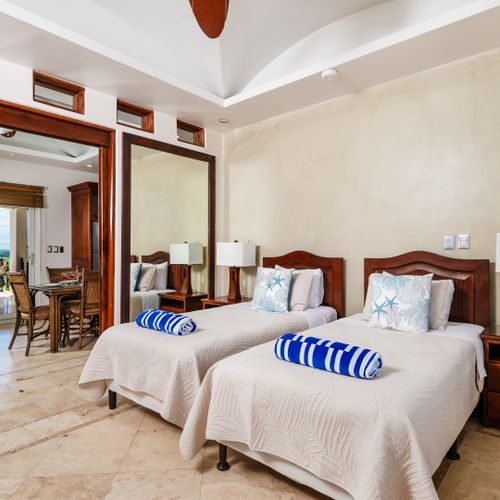 Second bedroom with a sliding door to the dining room