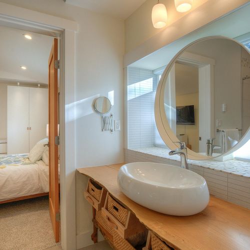 Beautiful custom vanity counter with plenty of storage space.