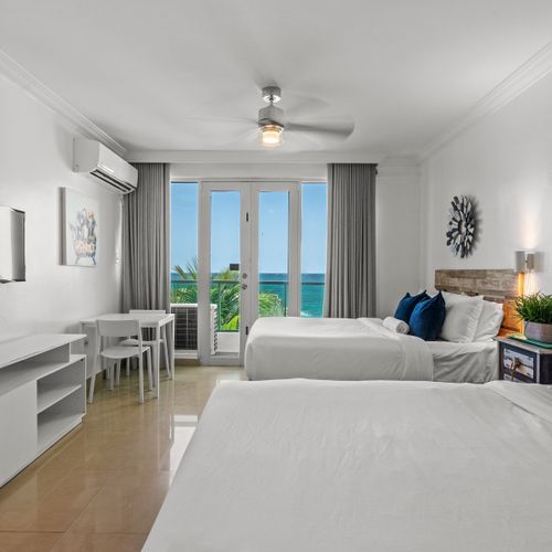 Wake up to breathtaking ocean views from your comfortable king and queen size beds, with direct access to your private balcony overlooking the sparkling Caribbean Sea.