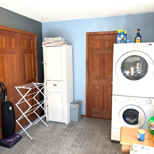 BEDROOM #5 (SECOND FLOOR):  Mixed up bedroom on the second floor with a trundle bed, loveseat, and a washer and dryer.