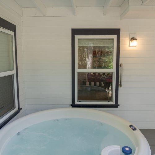 Four person hot tub under cover!