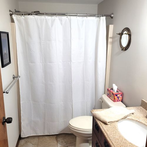 BATHROOM #1:  Private ensuite full bathroom for Bedroom #1, with a walk-in shower.