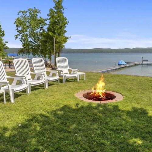 EXTERIOR:   The private bonfire ring
