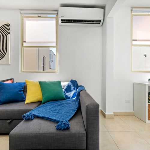 Settle in and feel at home. The stylish living area is designed for comfort and relaxation, with plenty of space for everyone.