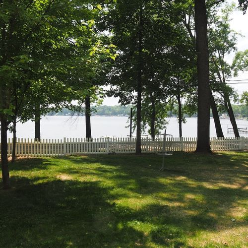 Exterior:  the large and fully fenced-in front yard, which includes a great view of the lake as well as a little disc golf course.
