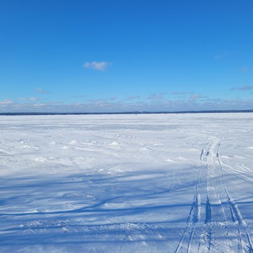 Exterior:  as shown, you can snowmobile out onto the lake if the ice is thick enough.