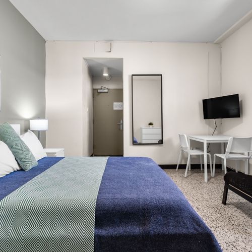 Olimpo | Room With Balcony 38 Ample Comfort. Unwind in a space designed for your well-being.
