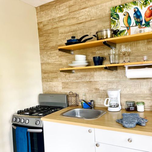 Everything you need for a quick bite or a gourmet meal: Find all your essential dishes, glassware, and utensils neatly organized.