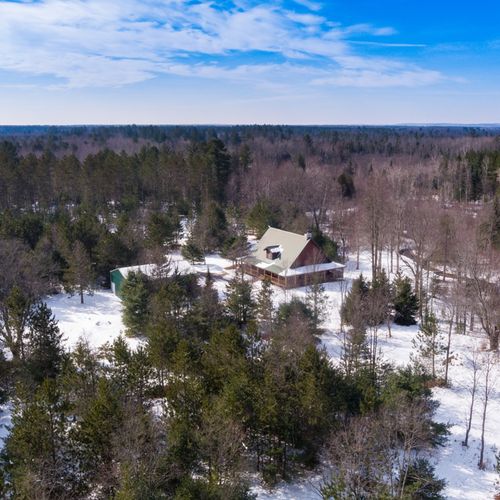Exterior:  aerial photo in the winter, highlighting the seclusion and privacy of the area.