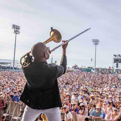 Feel the energy of live music just steps away — NOLA's legendary festival scene at your doorstep.