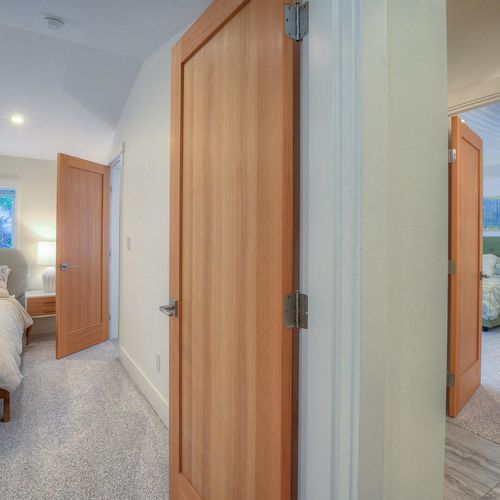 Both large bedrooms have a private entrance but share one full bathroom.