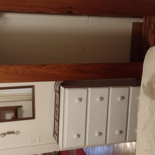 Bedroom #2:  features a full-size bed, nightstand, lamp, dresser. And closet.
