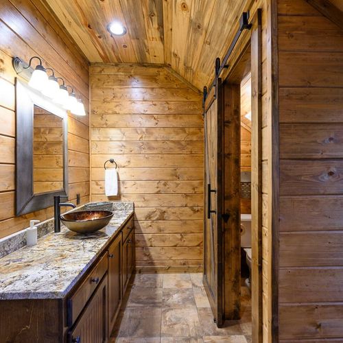 The private bathroom has a walk-in shower.