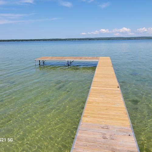 OVERVIEW:  The home includes a fantastic private dock on Big Platte Lake!
