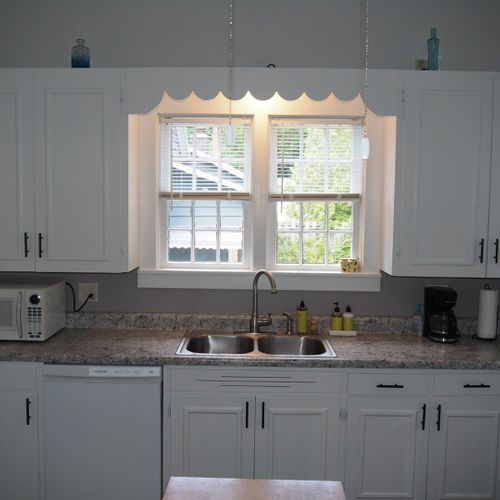 Kitchen:  the home has a huge kitchen that is complete with all modern appliances, including a dishwasher. A good supply of cooking and dining utensils are included as well.