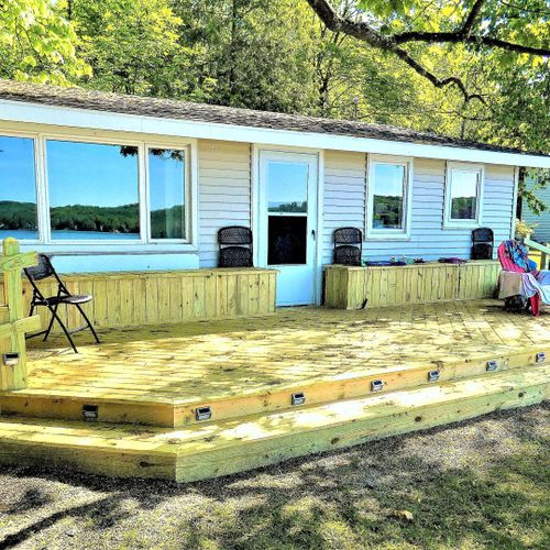 Exterior:  the backside of aspen, which faces the lake, highlighting the new deck.