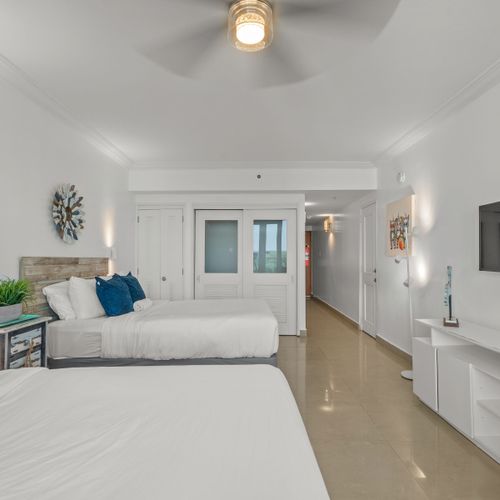 Experience tranquility and luxury in this well-appointed room, designed for ultimate relaxation with incredible ocean views and abundant natural light.