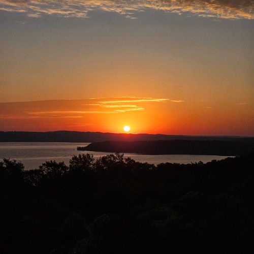 EXTERIOR:  Sunrise over Crystal Lake from the property