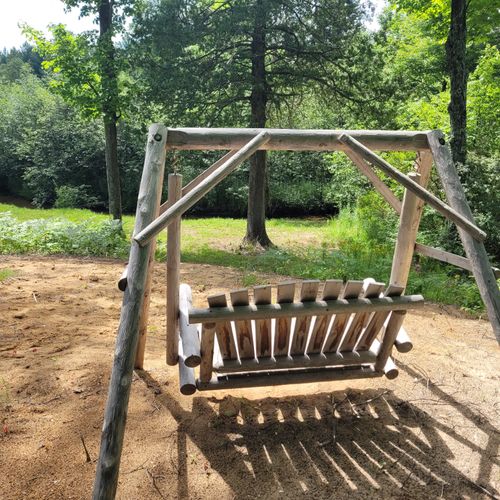 Exterior:  the lovely wooden swing that faces first creek.