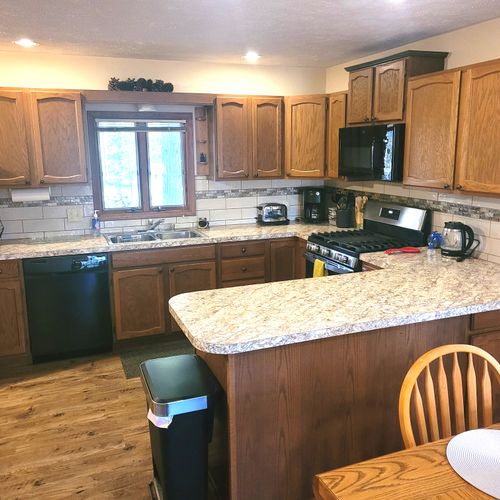 OVERVIEW:  The home has a large and modern kitchen with all appliances including a dishwasher.  A good supply of cooking and dining utensils is also included.