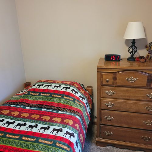 BEDROOM #4 (SECOND FLOOR):  Cute room with 2 twin beds, dresser, and a lamp.