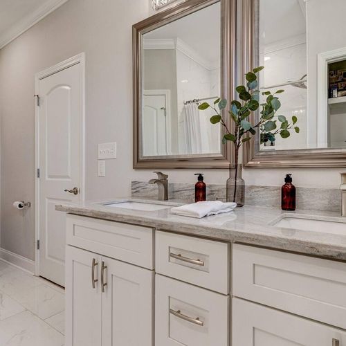 Master bathroom w/ double sinks vanity & plenty of counter space for two.