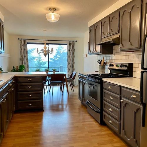Open kitchen and dining area with water views.