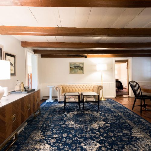 A step up from the kitchen is another sitting area.