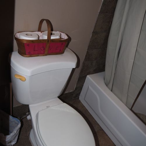 Bathroom:  includes combination tub / shower and toilet. (note that there is no vanity, sink, or mirror in the bathroom. )