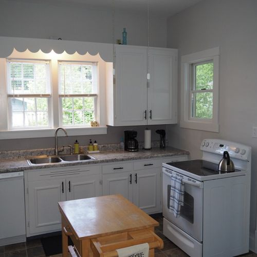 Kitchen:  the home has a huge kitchen that is complete with all modern appliances, including a dishwasher. A good supply of cooking and dining utensils are included as well.
