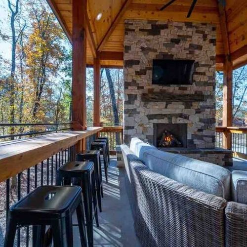 Bar top seating and the outdoor gas fireplace!