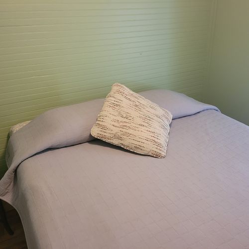 Bedroom 2:  features a queen-size bed.