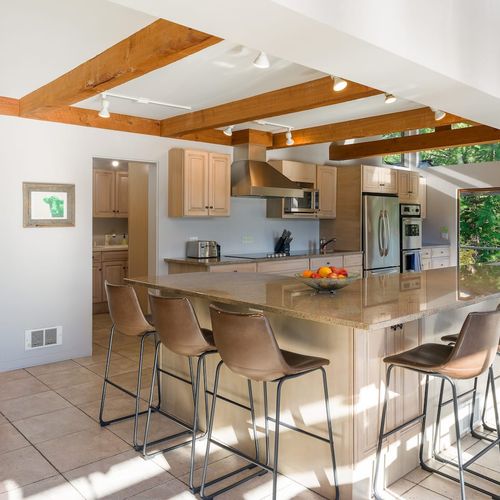 Spacious, fully equipped gourmet kitchen with counter dining.