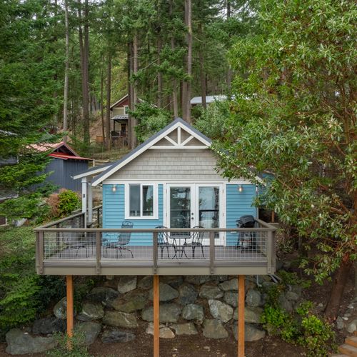 Nestled in a quiet neighborhood overlooking the quaint town of Eastsound