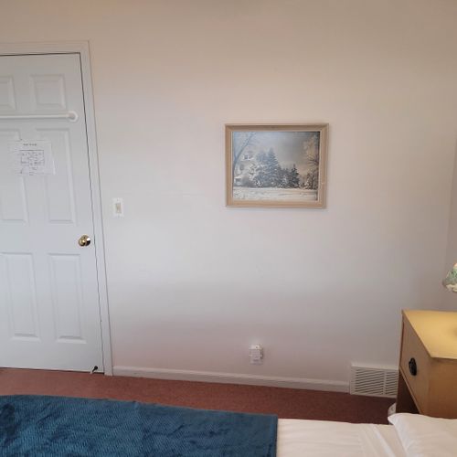 Bedroom #3 (upper level):  features a full-size bed, ceiling fan, closet, and great views of lake michigan.