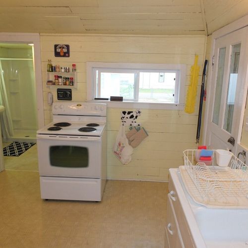 Kitchen:  the cottage has a cute old kitchen with all appliances except for a dishwasher.