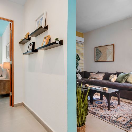 An open-plan room for a smooth flow between areas and lavish decor.